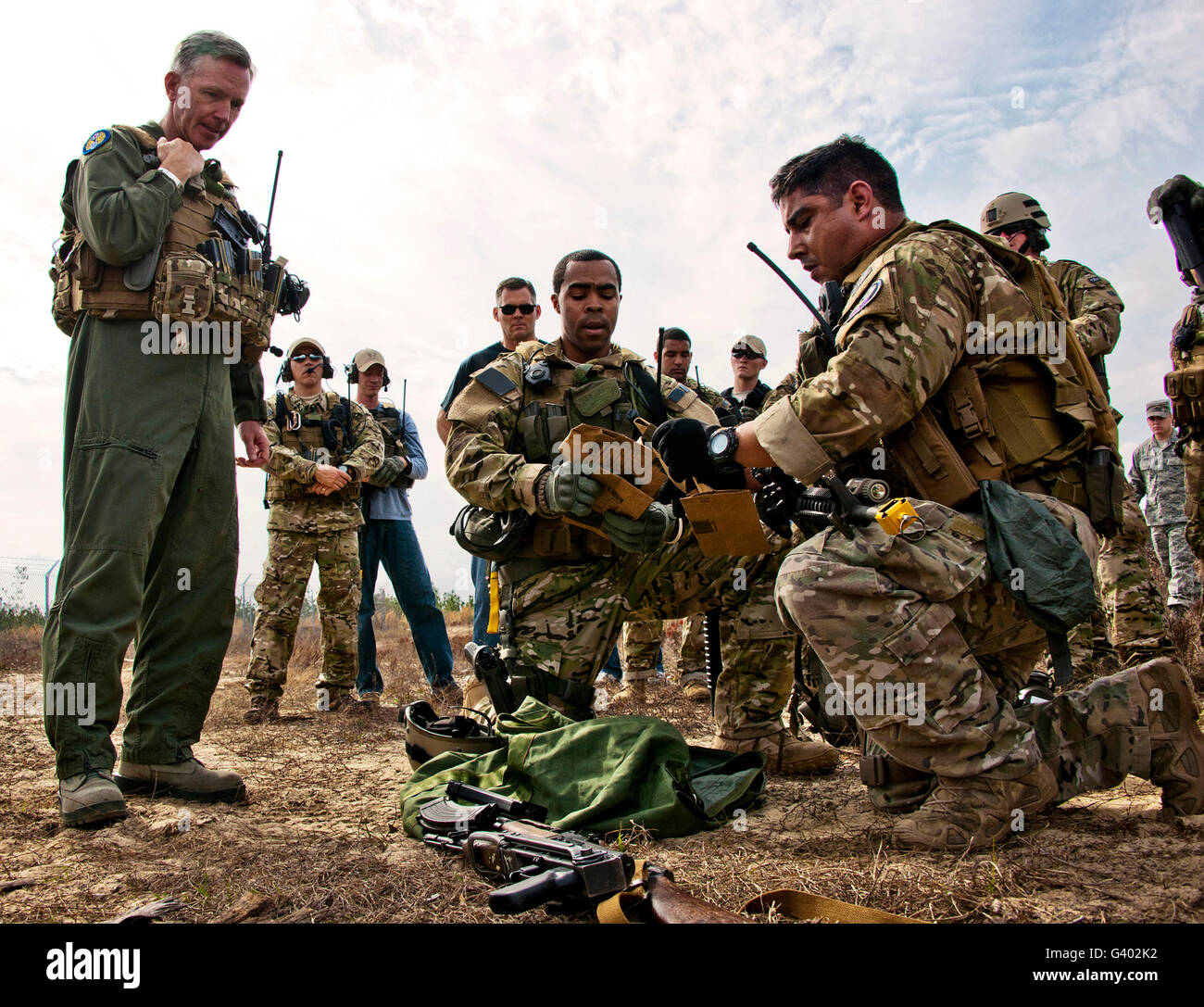 Airmen explain their evidence gathering procedures to their commander. Stock Photo