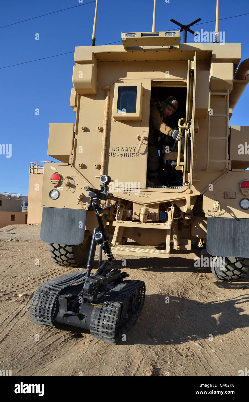 A Talon Mark 2 bomb disposal robot is deployed from a rapid response vehicle. Stock Photo