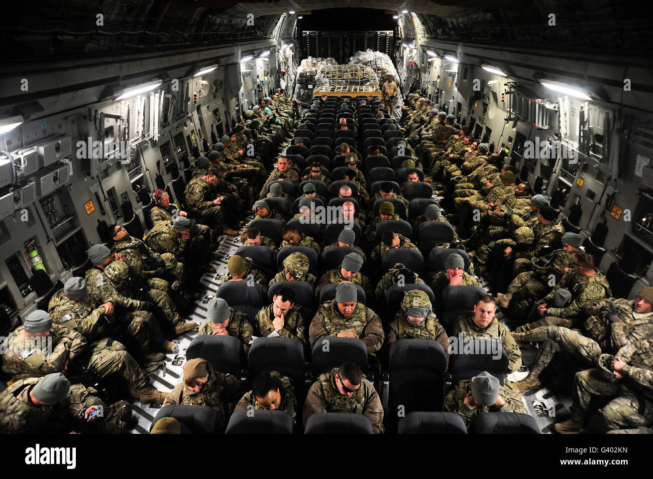 A unit of U.S. Army soldiers in a C-17 Globemaster III. Stock Photo