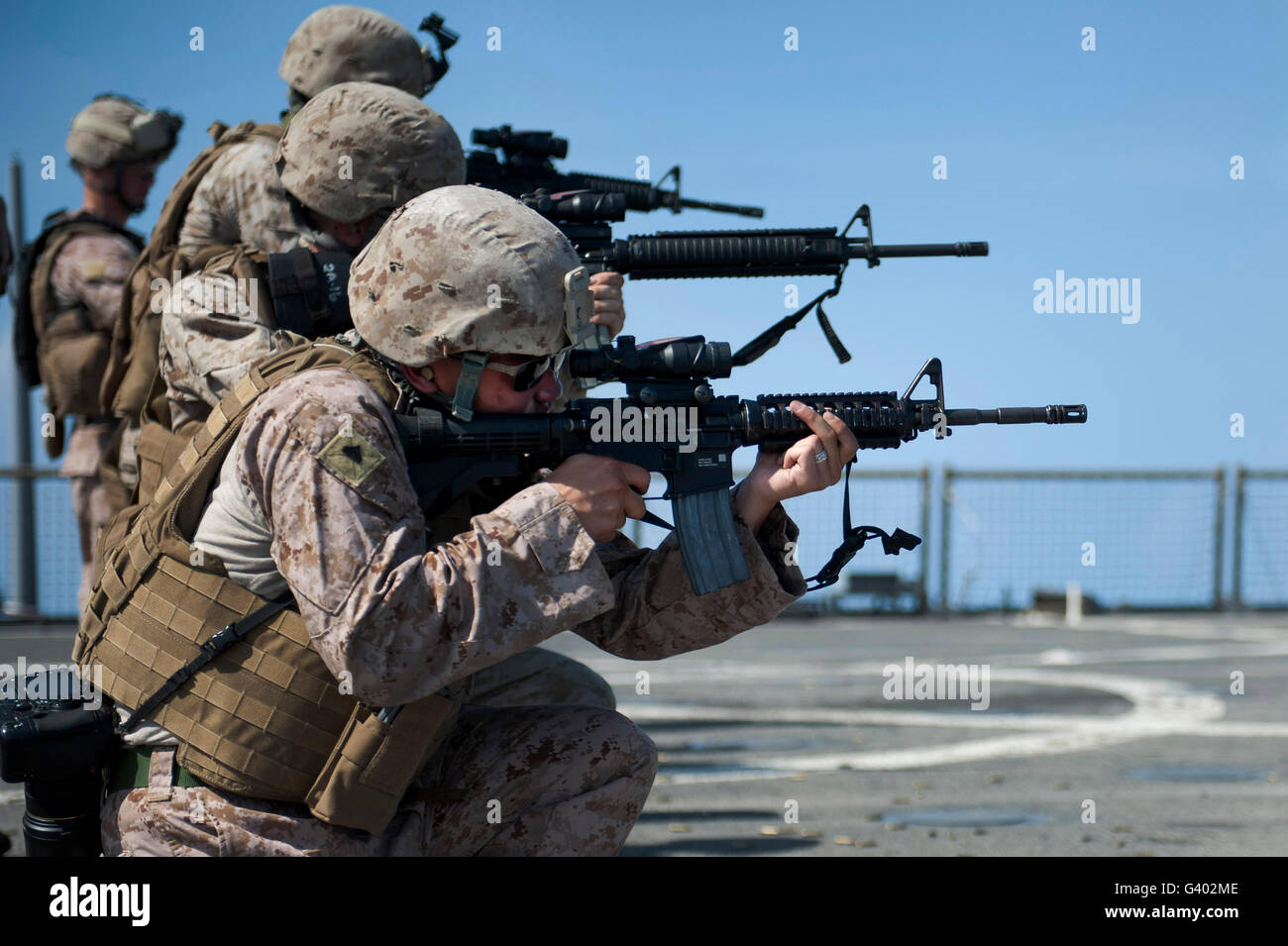 Marines participate in M16 rifle marksmanship training aboard USS Pearl Harbor. Stock Photo