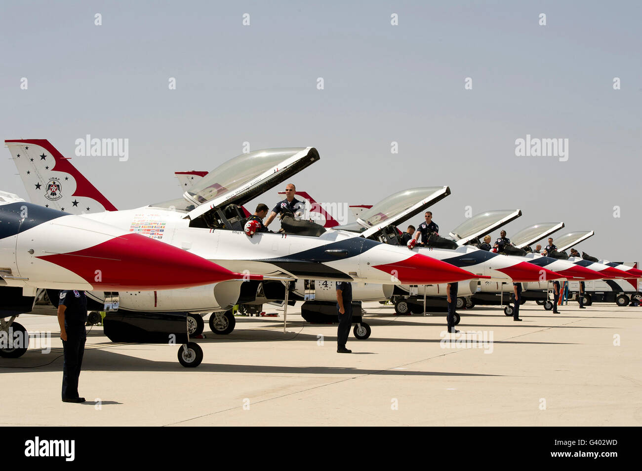 Airmen conduct preflight preparations on F-16 Thunderbirds. Stock Photo