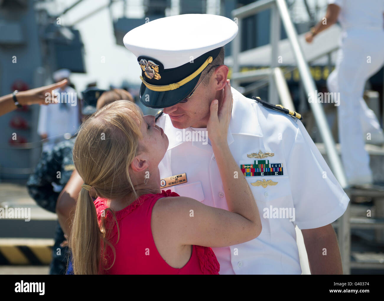 Sailor says goodbye to his wife prior to deployment. Stock Photo