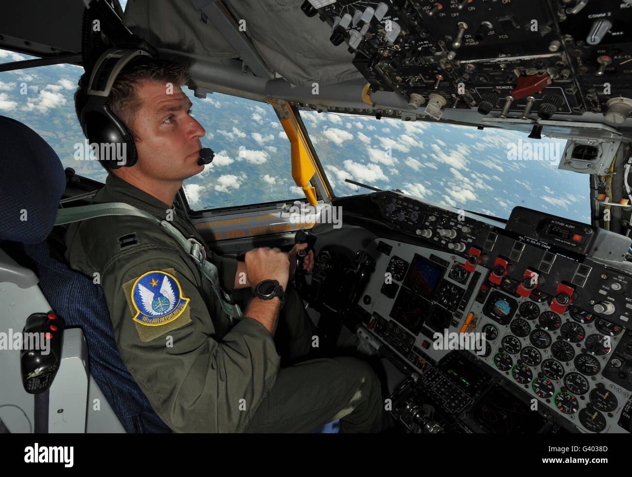 U.S. Air Force pilot checks the cockpit console of a KC-135 Stratotanker. Stock Photo
