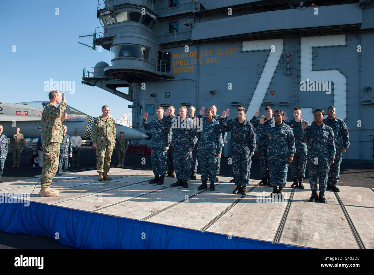 Chief of Naval Operations performs a re-enlistment ceremony. Stock Photo