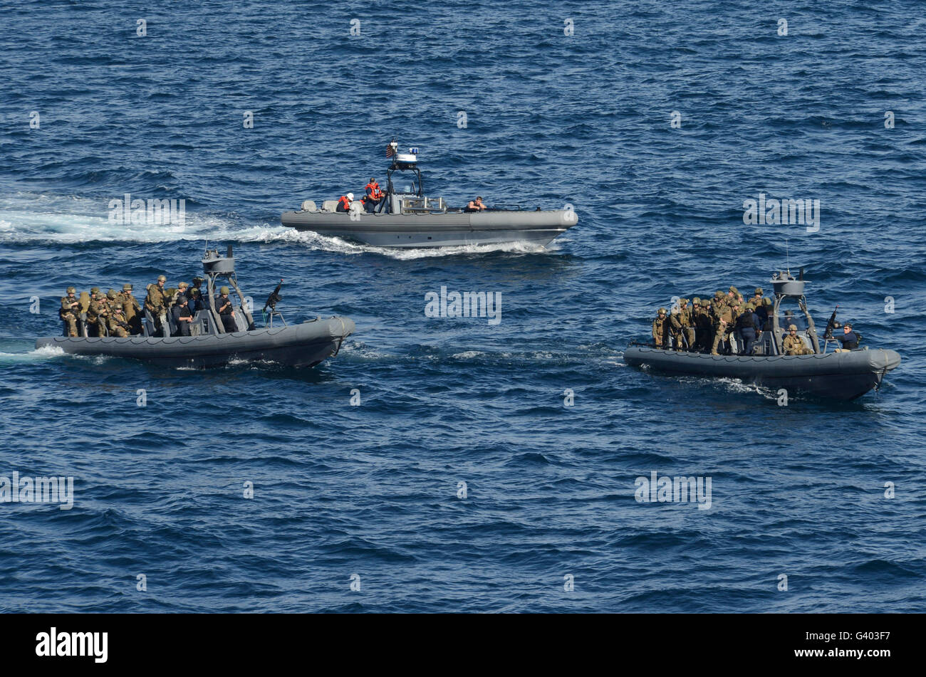 Sailors and Marines participate in a visit, board, search and seizure. Stock Photo