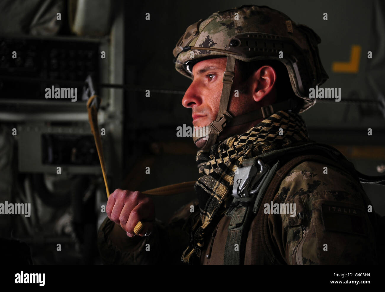 A paratrooper from the Italian Army waits for jump approval. Stock Photo