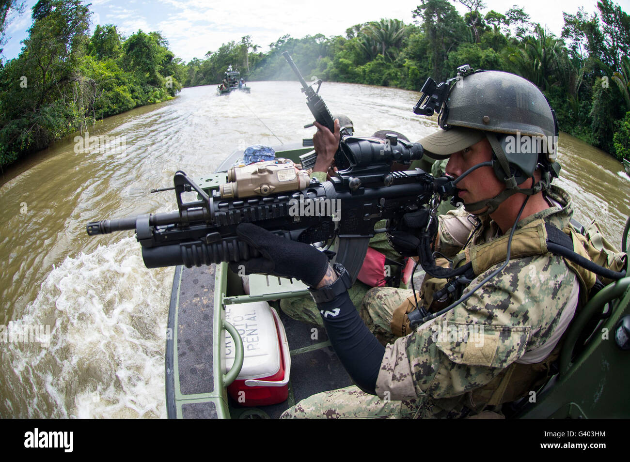 Gunner's Mate conducts insert extract training with the Belize Special Boat Unit. Stock Photo