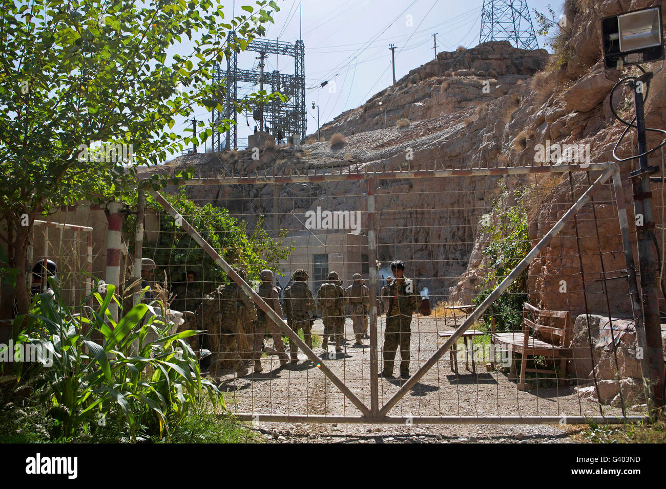 Coalition forces pass through a gate at the Kajaki Dam, Afghanistan. Stock Photo