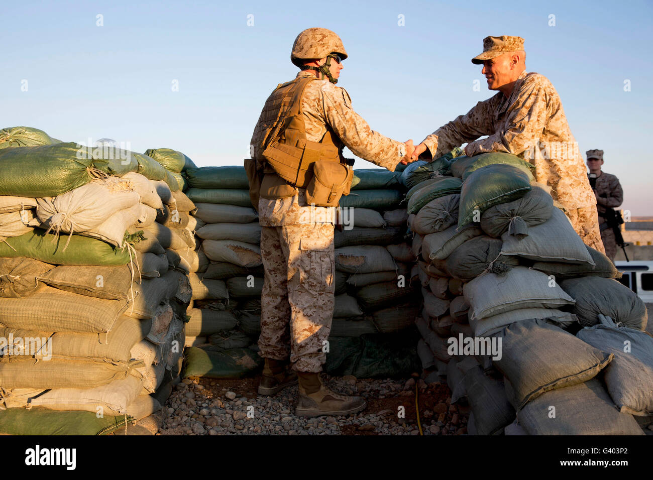 U.S. Marines greet each other at Camp Bastion, Afghanistan. Stock Photo