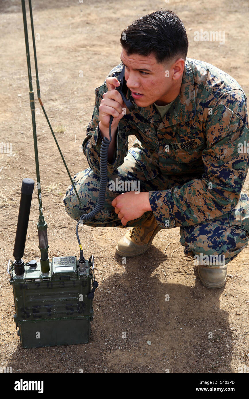U.S. Marine conducts radio checks. Stock Photo