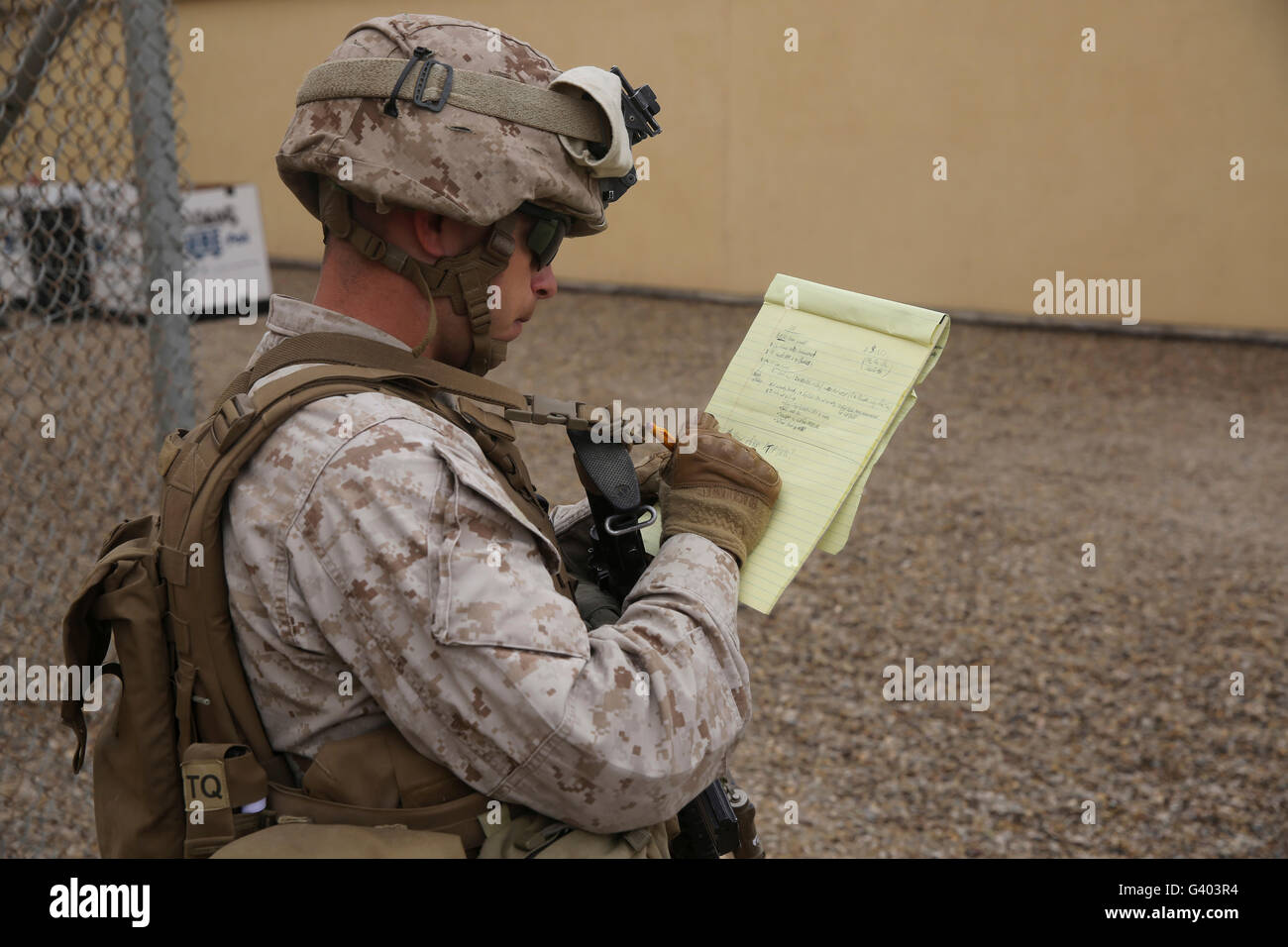 U.S. Marine evaluates Navy corpsmen. Stock Photo