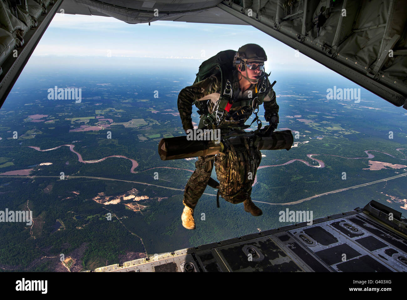 A U.S. Air Force combat controller jumps out of an MC-130J Commando II. Stock Photo