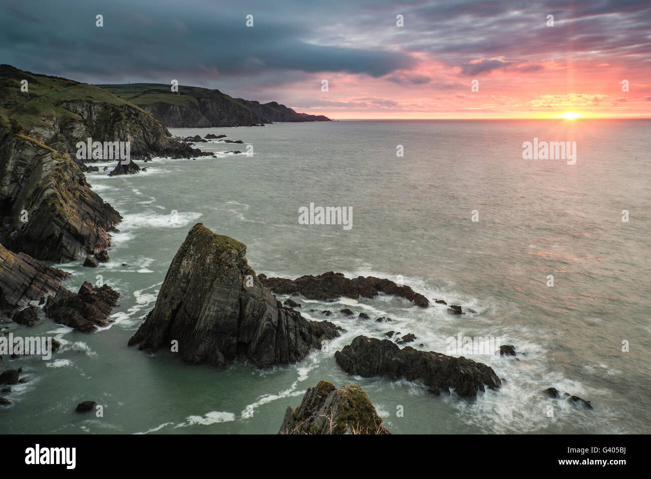 Dramatic sunrise landscape over Bull Point in Devon England Stock Photo ...