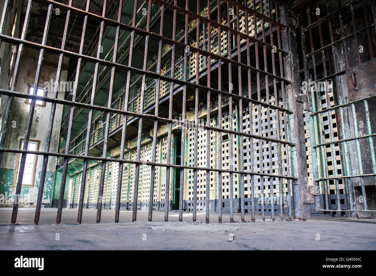 Low view showing how the prison bars are setup when the prisoners are locked away Stock Photo