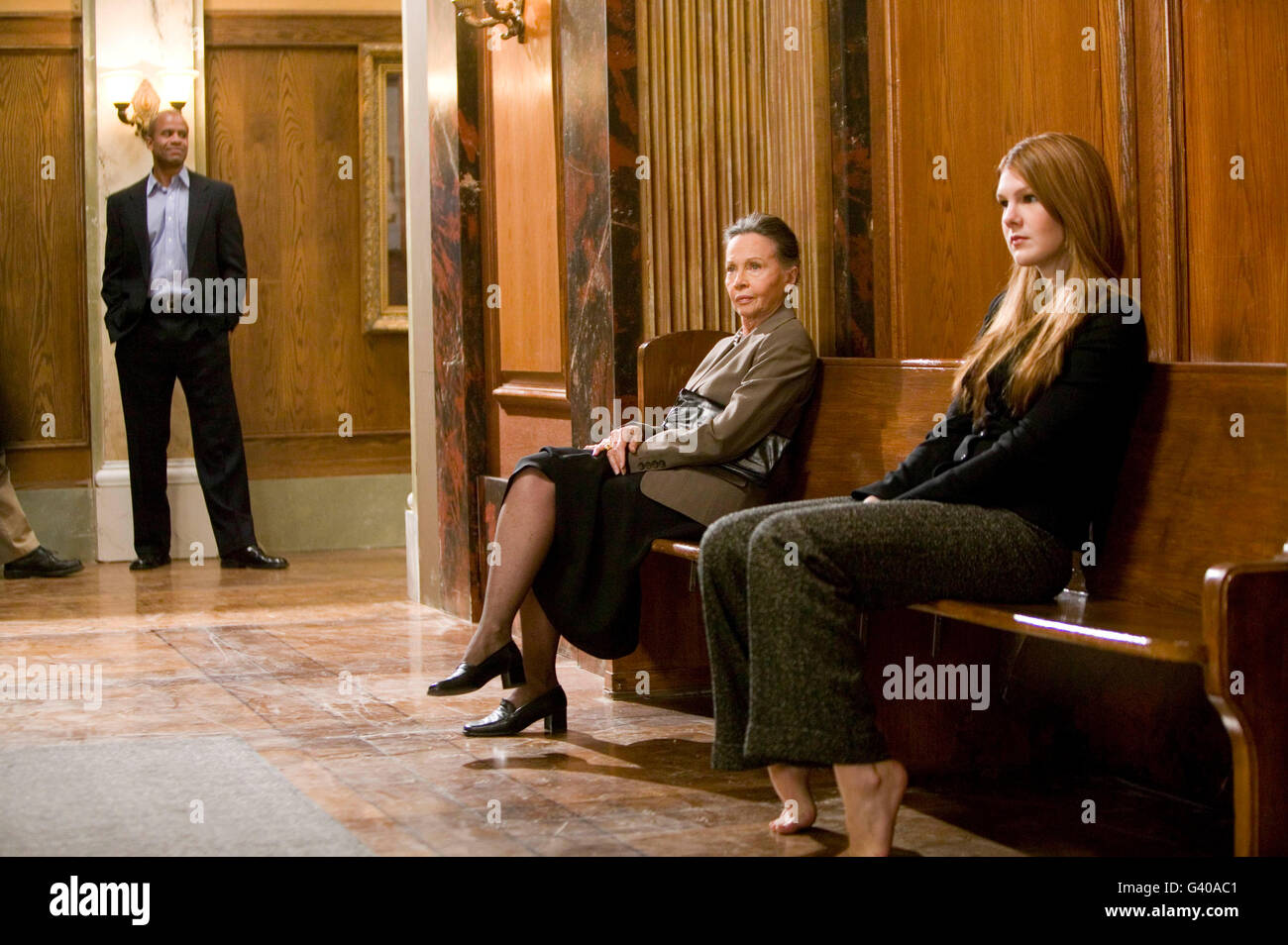 8 May 2006 - North Bergen, NJ - Leslie Caron (C) waits between takes with actress Lily Rabe (R) on set of Law & Order SVU Stock Photo