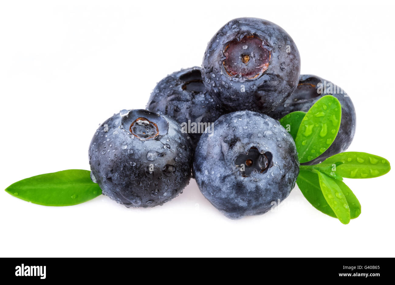 Blueberry on white, organic berry with leaves. Stock Photo