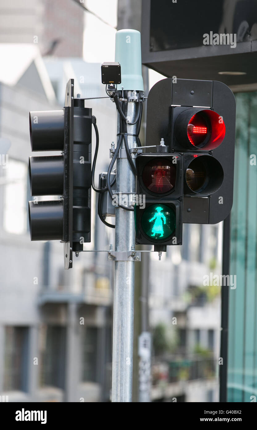 'Green lady' pedestrian signal at street crossing in Richmond, Melbourne, to honour Mary Rogers, Victoria's first female councillor., May 2016. Stock Photo