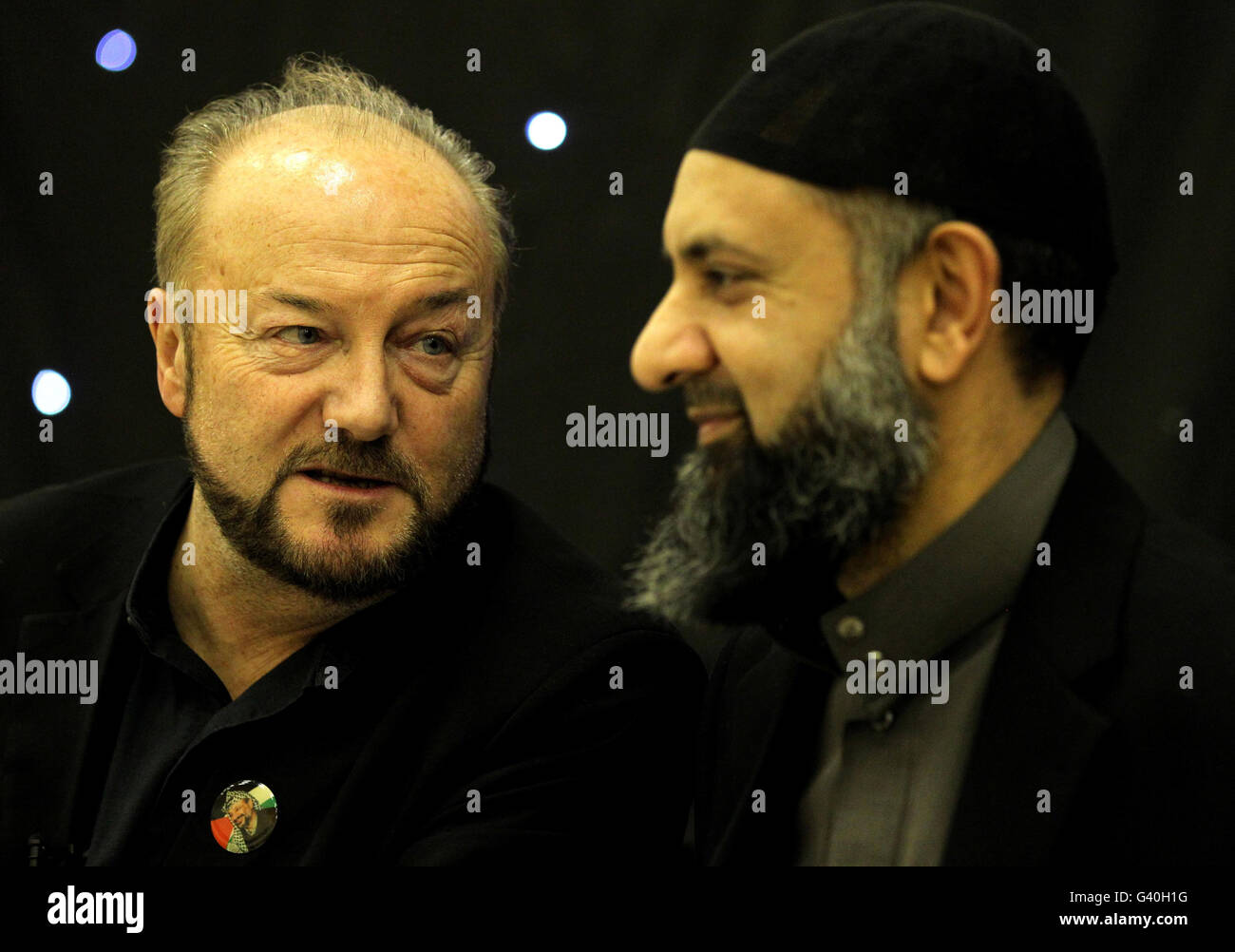 Former MP George Galloway with Ismail Patel chairman of Friends of Al Aqsa Peace in Palenstine Glasgow branch, during his visit to the Central Mosque in Glasgow, after he said he may end his political career in Scotland if he secured a seat in this year's Scottish Parliament election. Stock Photo