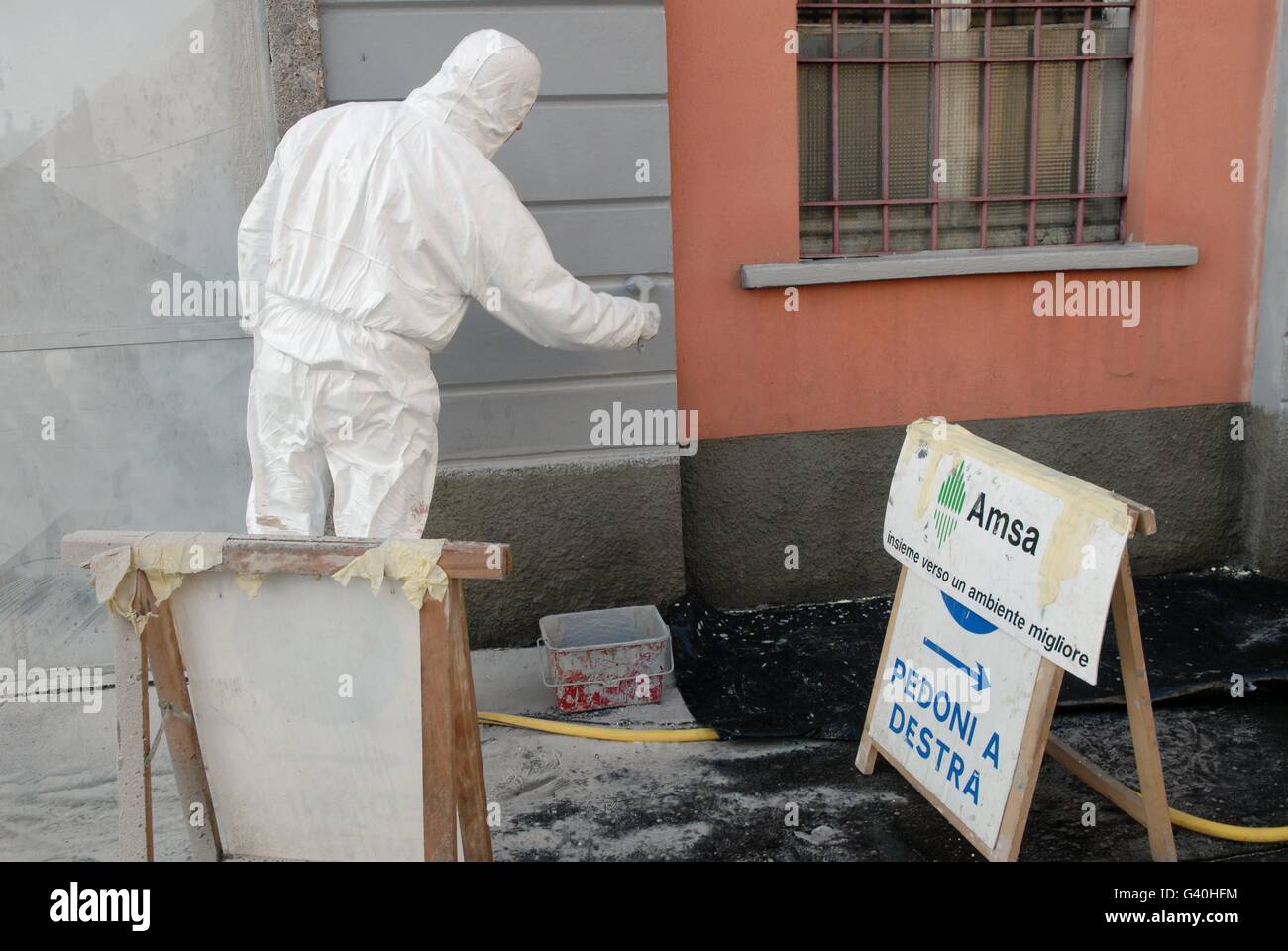 Milan (Italy), municipal service of  AMSA (Milan Company for Environmental Services) for graffiti cleaning Stock Photo
