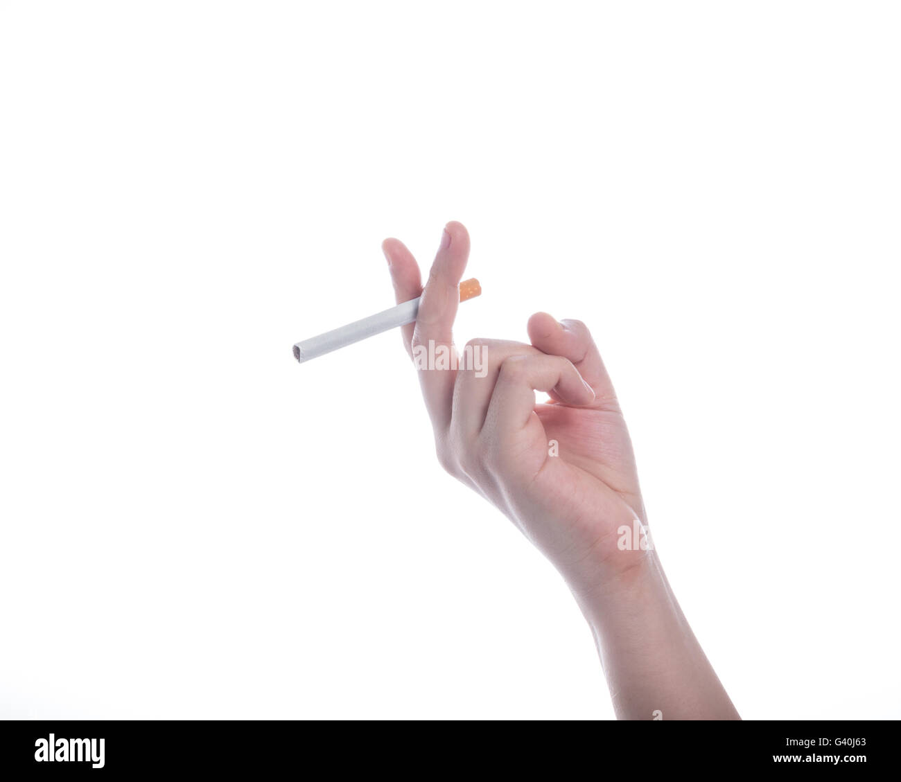 World No Tobacco Day,Female hand holding a cigarette on a white background  Stock Photo