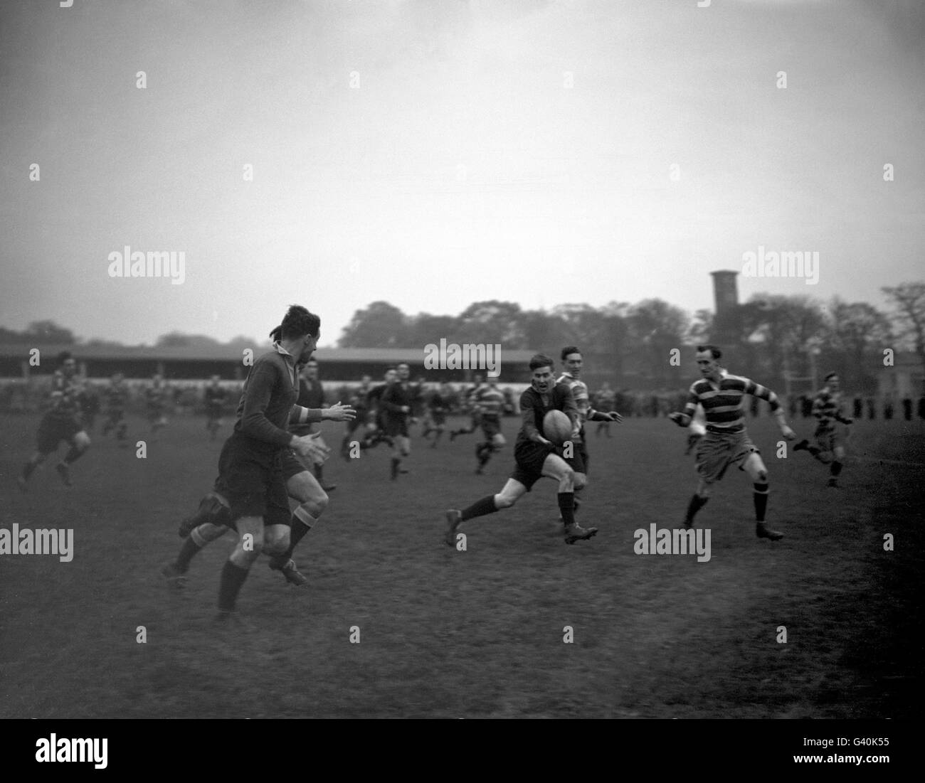 Brian Boobbyer (Oxford) passes to Ian Botting (Oxford) before being tackled. Stock Photo