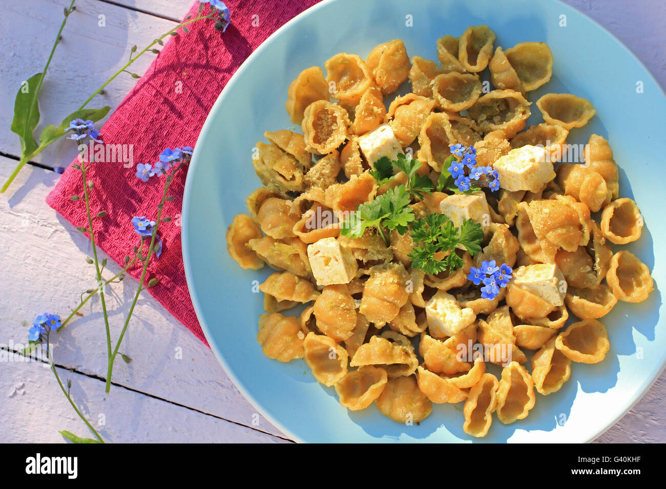 Fresh healthy vegetarian meal, wholemeal pasta with tofu Stock Photo