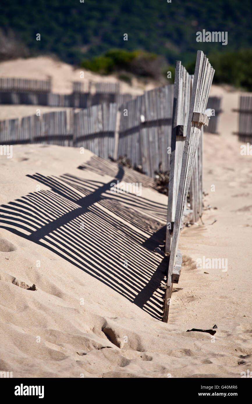 Fence, shadows, sand, Parque Nacional Donana, Costa de la Luz, Huelva, Andalusia, Spain, Europe Stock Photo