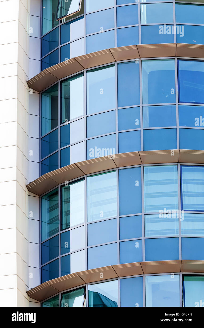 Modern building detail with blue glass facade Stock Photo - Alamy