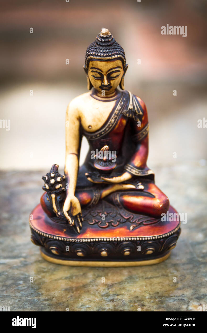Nepalese sculpture of Buddha kept for sale in the street of Kathmandu