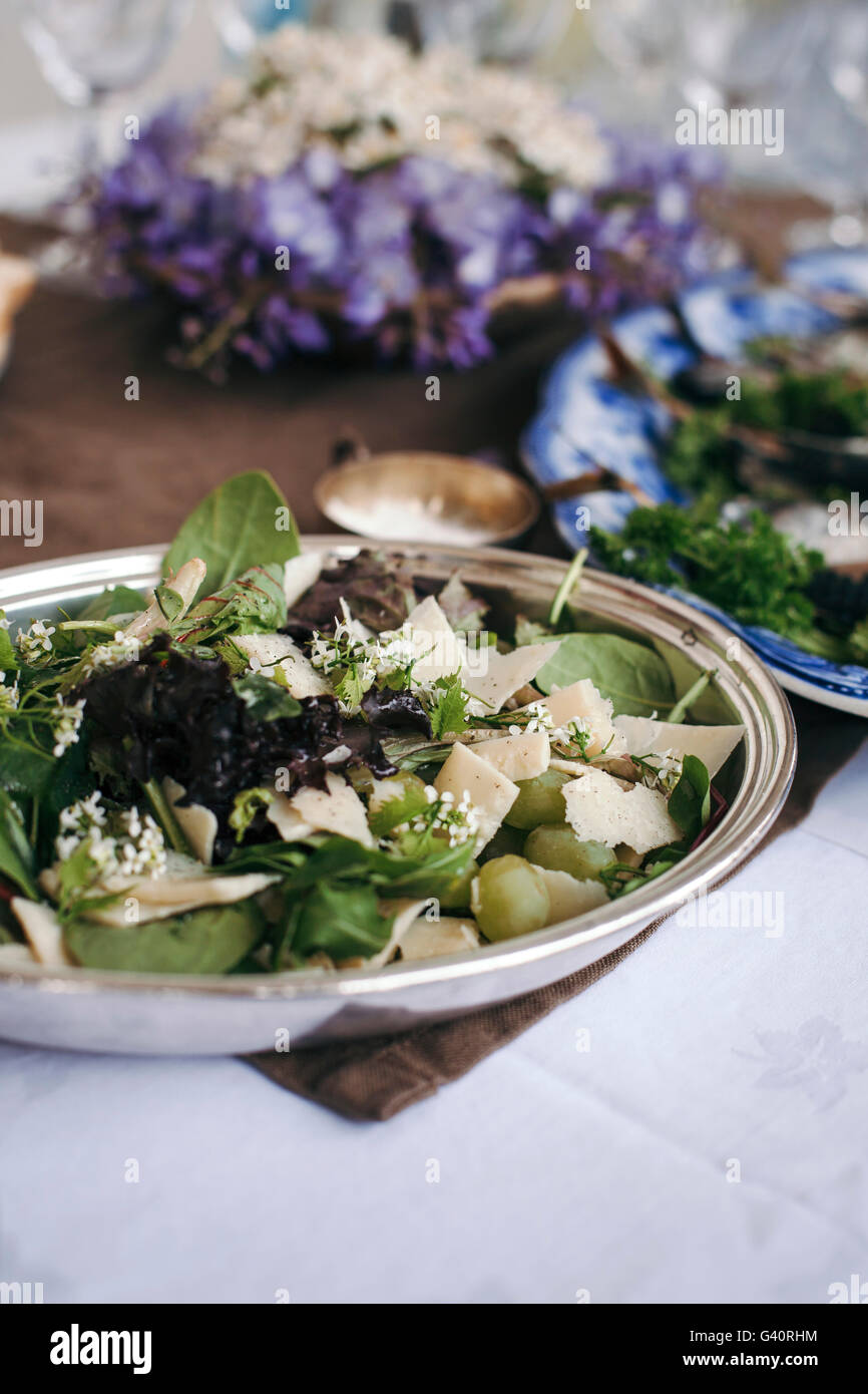 Mixed greens, grapes and Parmesan cheese salad for summer lunch Stock Photo