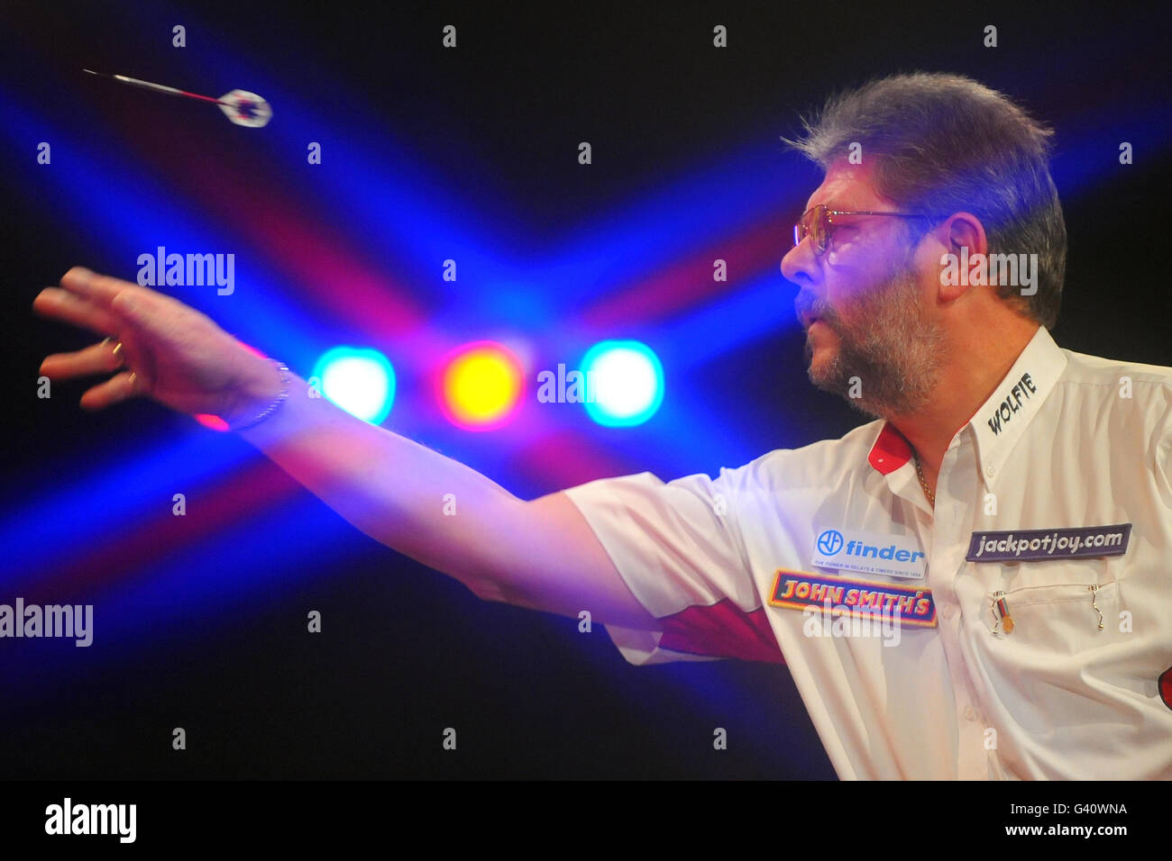 England's Martin Adams in action during his final against England's Dean Winstanley during the BDO World Professional Darts Championship at the Lakeside Complex, Surrey. Stock Photo