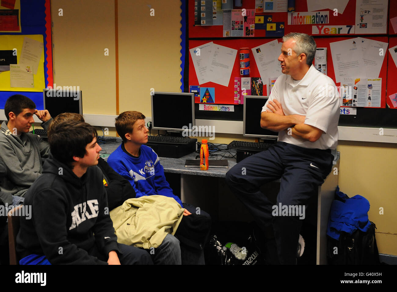 Referee chris foy talks to students from childwall sports college hi