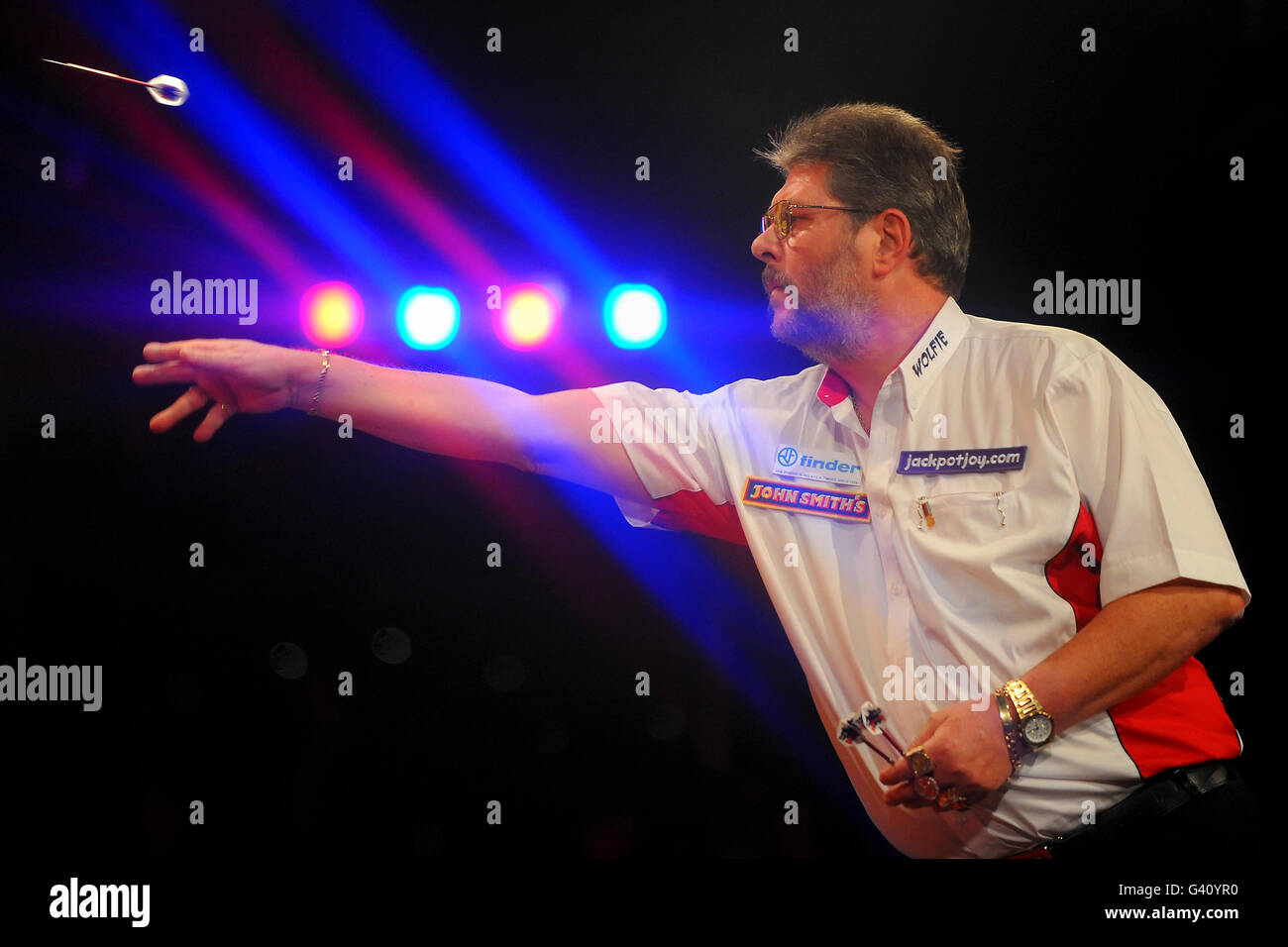 England's Martin Adams in action during his final against England's Dean Winstanley during the BDO World Professional Darts Championship at the Lakeside Complex, Surrey. Stock Photo