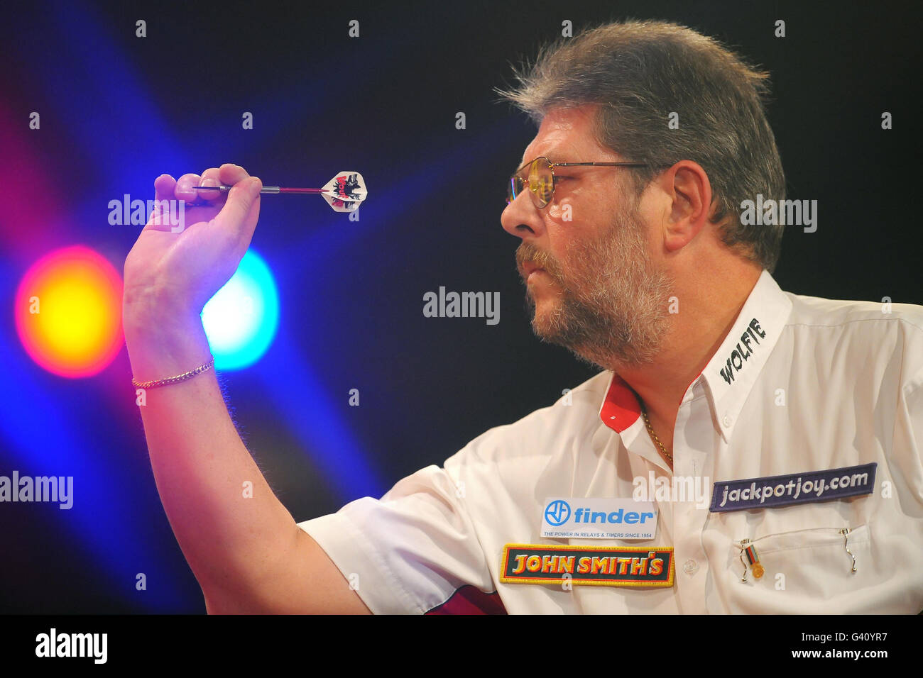 England's Martin Adams in action during his final against England's Dean Winstanley during the BDO World Professional Darts Championship at the Lakeside Complex, Surrey. Stock Photo