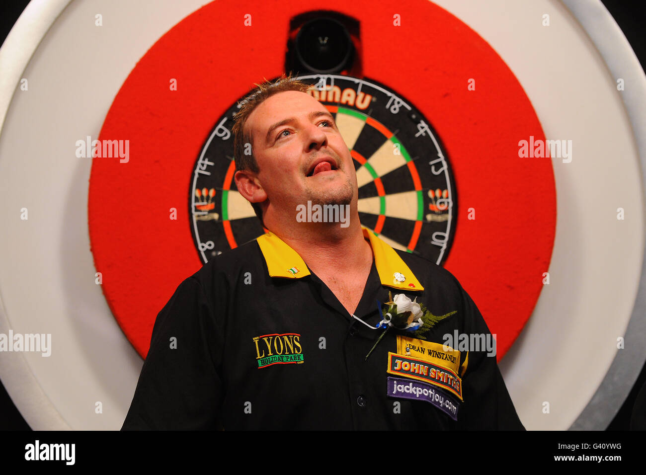 England's Dean Winstanley stands dejected after the final against England's Martin Adams during the BDO World Professional Darts Championship at the Lakeside Complex, Surrey. Stock Photo