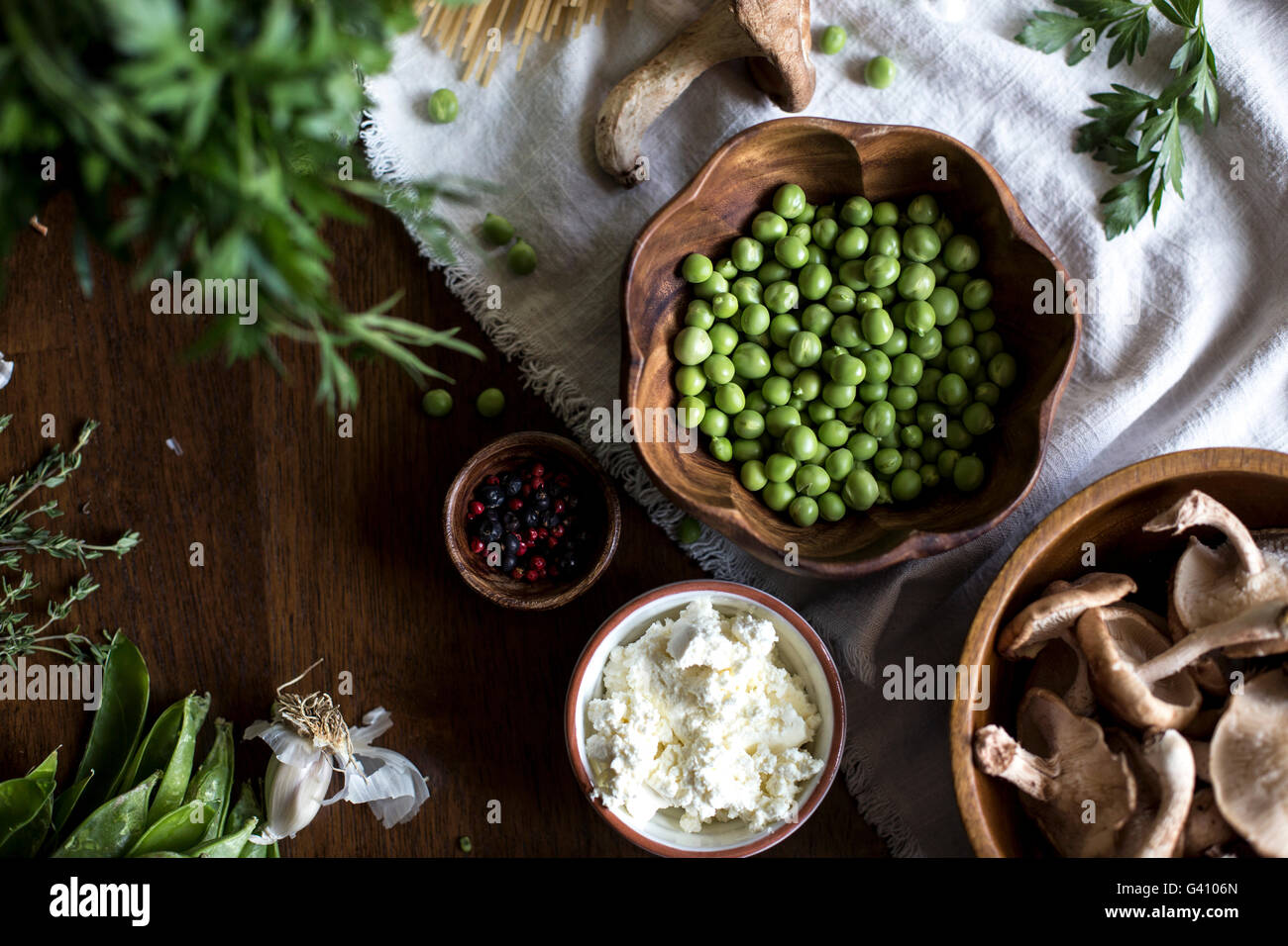 The ingredients for Creamy Mushroom Pasta with Fresh Peas and Ricotta