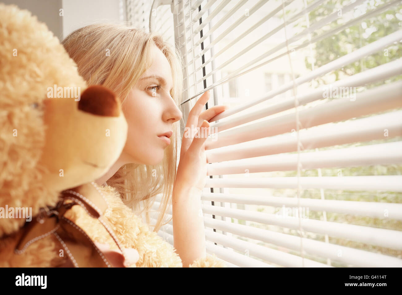 a girl with teddy