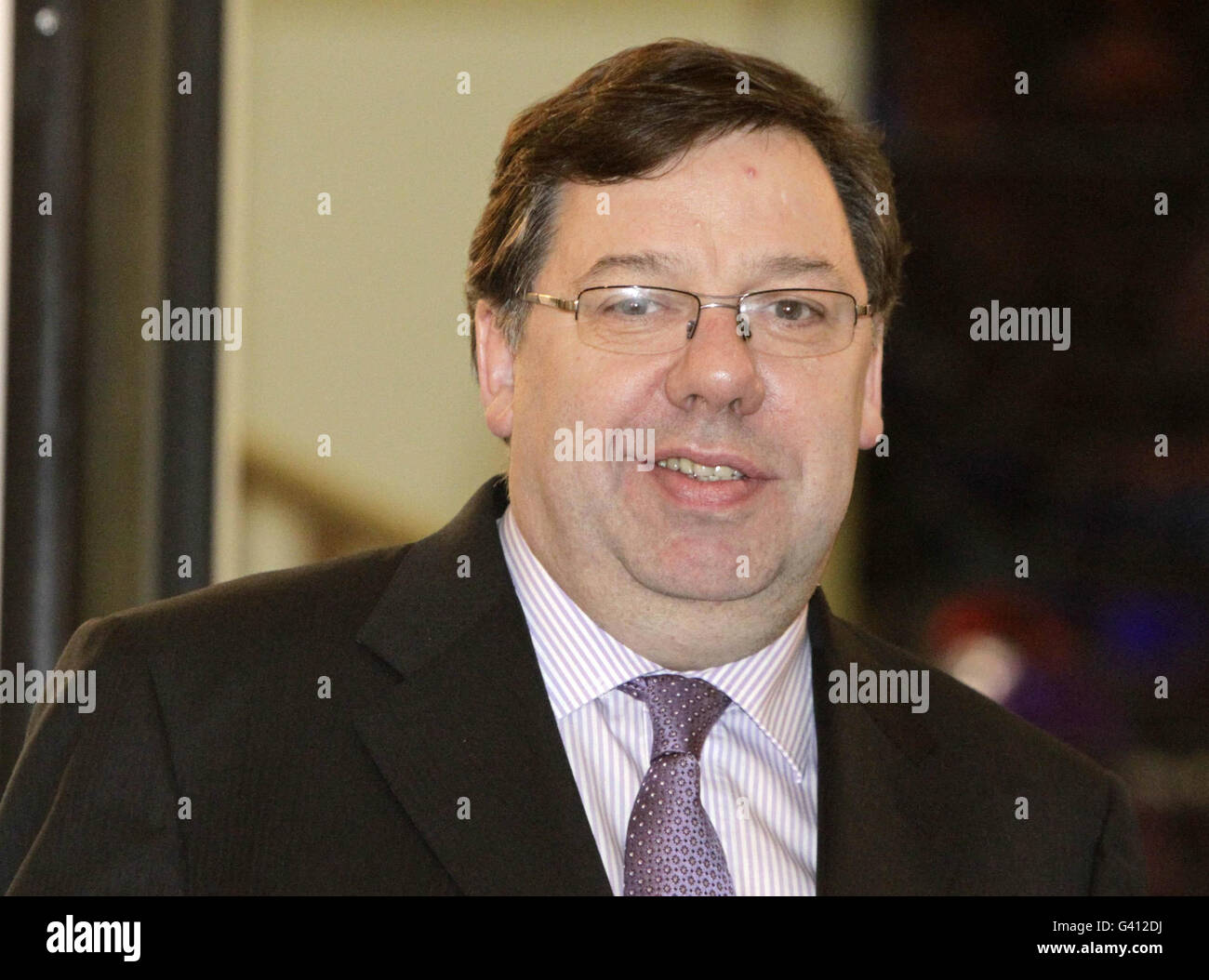 Taoiseach Brian Cowen poses for pictures at Government Buildings in Dublin, who retained control of the ruling Fianna Fail party after winning a motion of confidence in his leadership this evening. Stock Photo