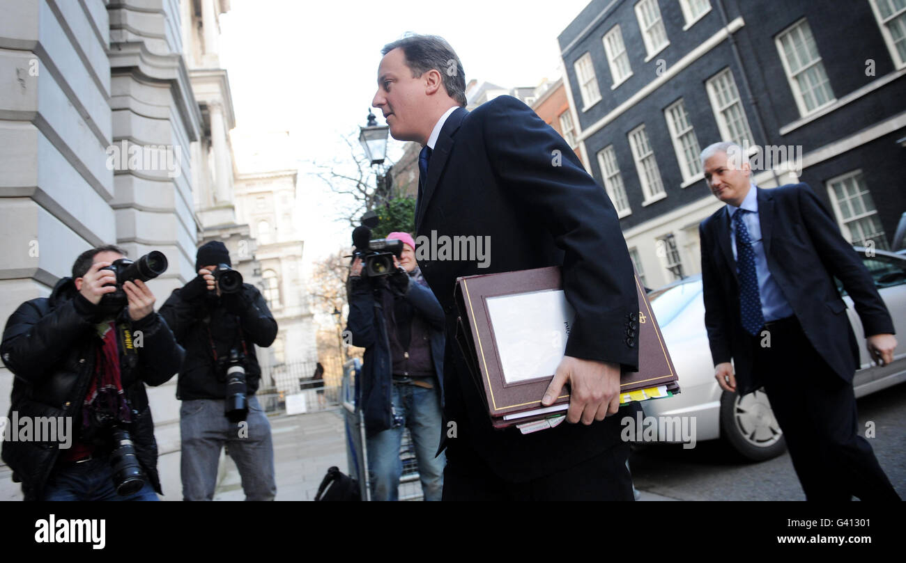 Prime Minister David Cameron leaves 10 Downing Street in London today for Prime Minister's Questions at the House of Commons. Stock Photo