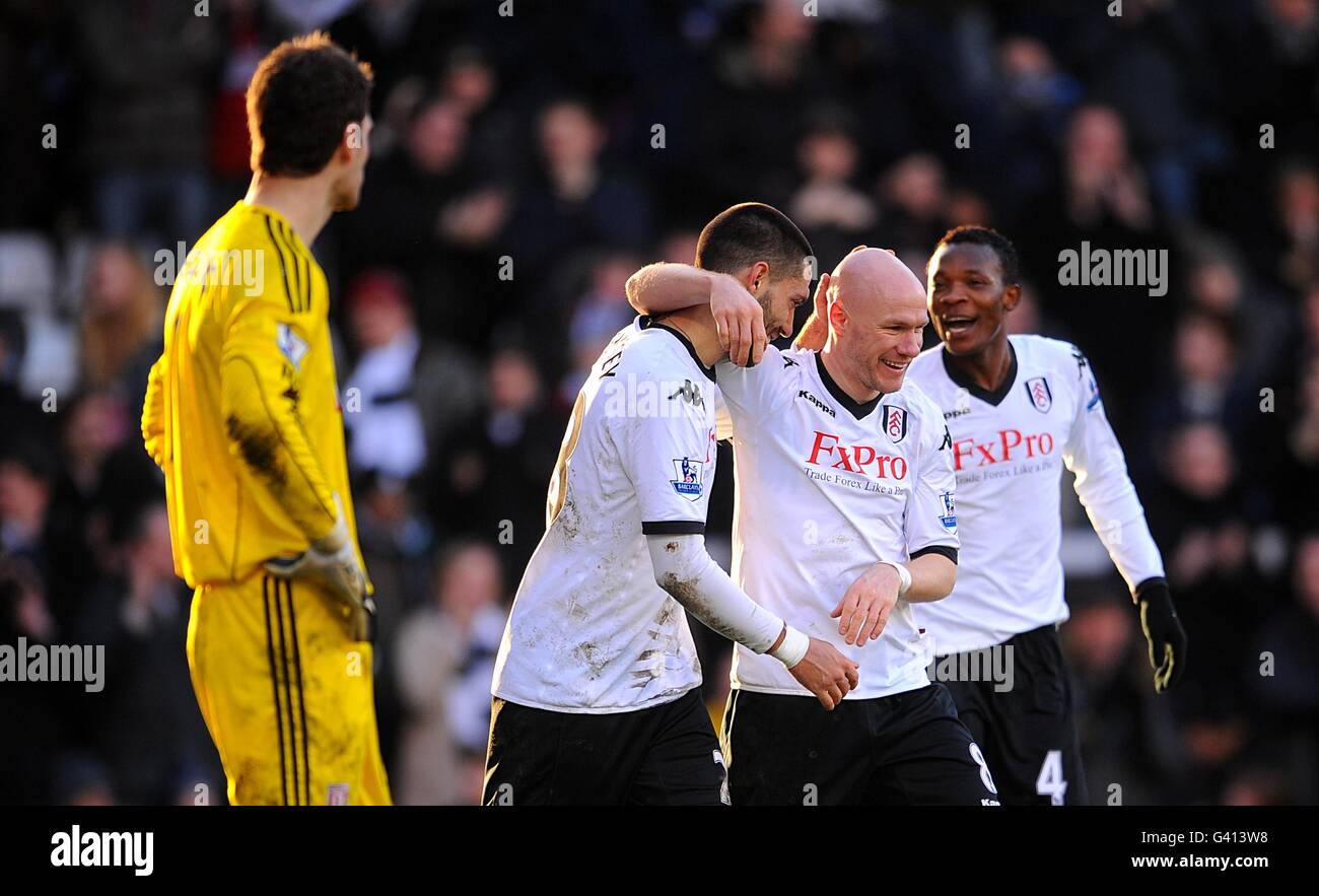 Clint dempsey fulham celebrates after hi-res stock photography and