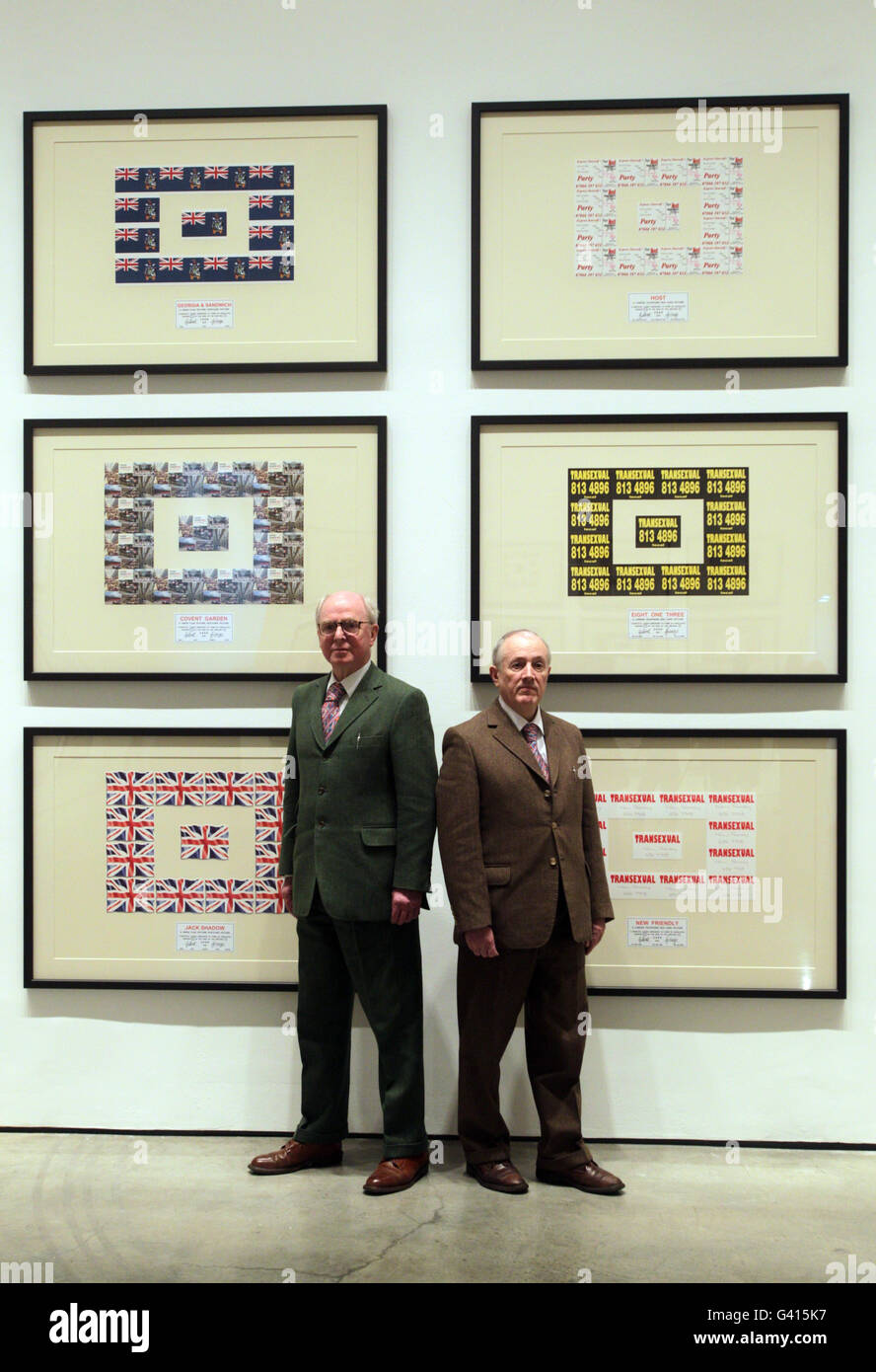 Artists Gilbert Proesch (right) and George Passmore (left) with their Urethra Postcard Art at White Cube in London. Stock Photo