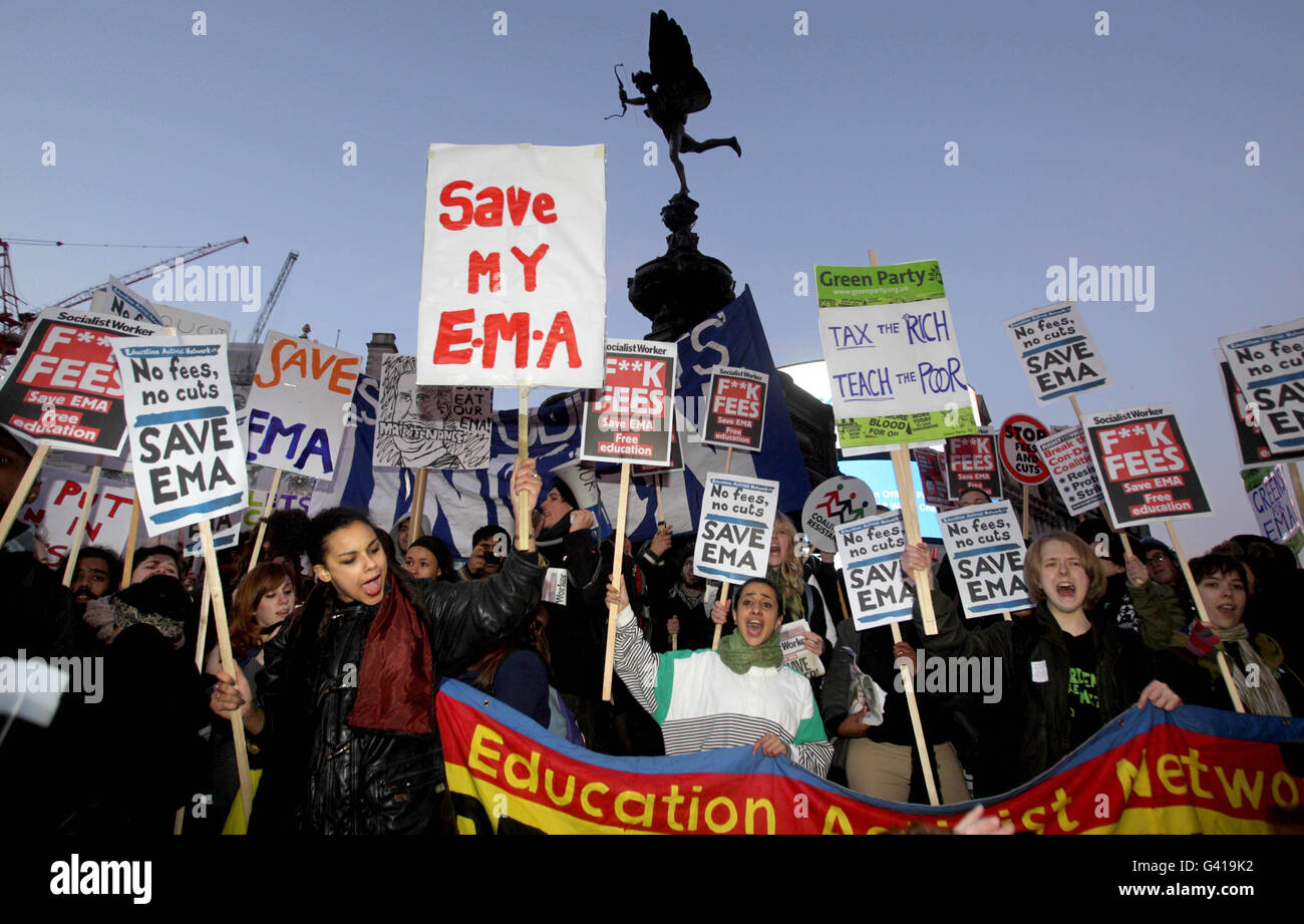 Protesters gather at Piccadilly Circus, London, before they walk to Parliament Square in a march against controversial plans to scrap the Education Maintenance Allowance (EMA). Stock Photo