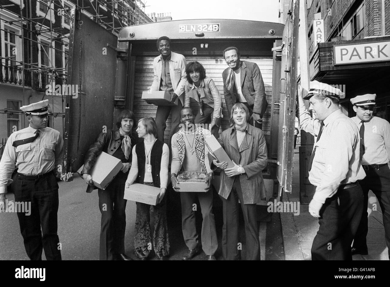 Because they say some of their songs have been pirated, The Foundations pop group have their latest album delivered by security truck. The group, back row, from left: Colin Young, Tony Gomez and Pat Burke. Front row, from left: Pater MacBeth, Alan Warner, Eric Allendale and Tim Harris. Stock Photo