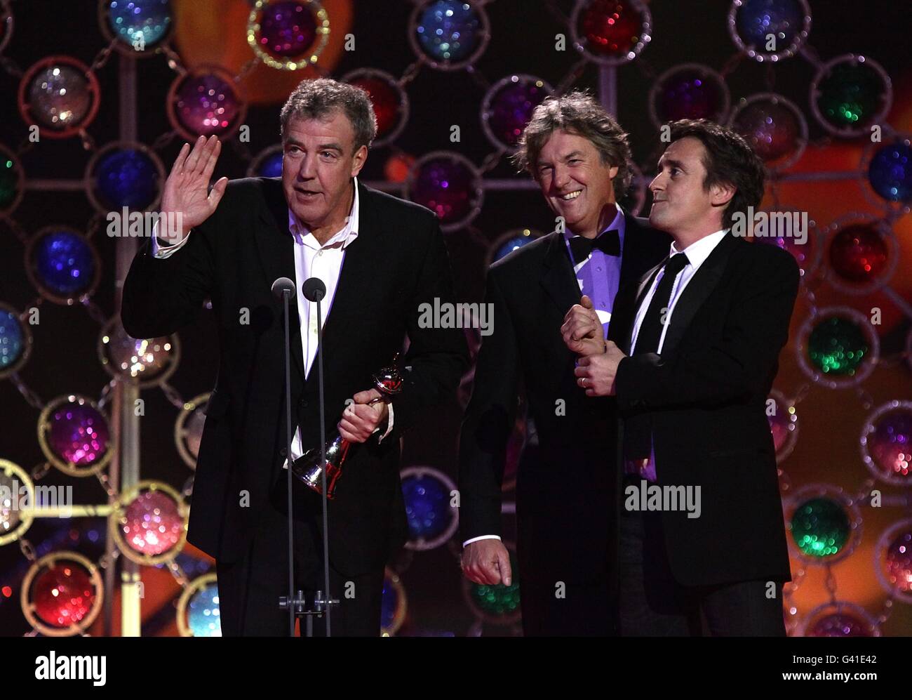 (L-R) Top Gear presenters, James May, Richard Hammond and Jeremy Clarkson collect the Most Popular Factual Programme award at the 2011 National Television Awards at the O2 Arena, London. Stock Photo