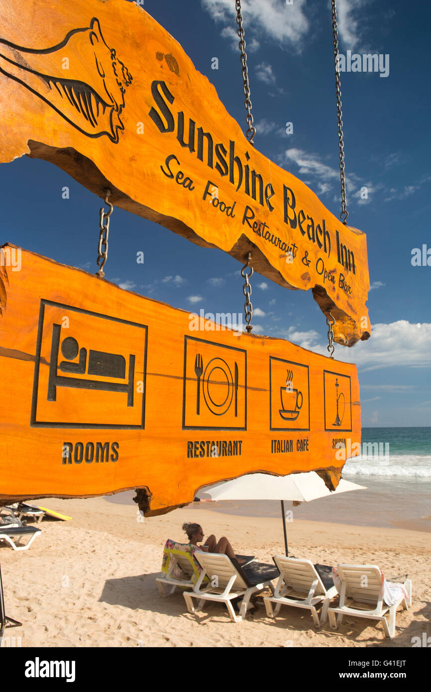 Sri Lanka, Mirissa beach, wooden sign advertising Sunshine Beach Inn Stock Photo
