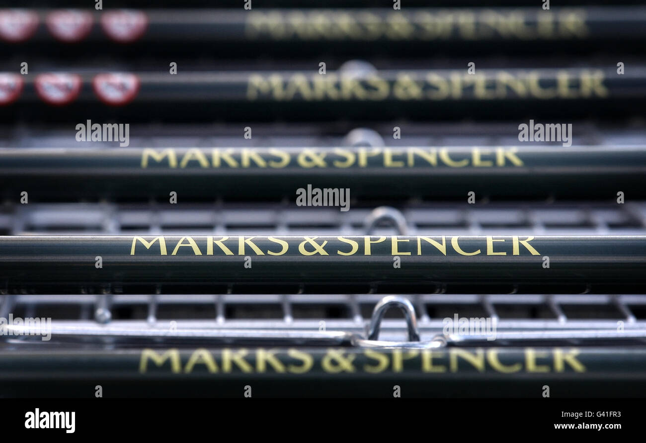 Stock photograph showing shopping trolleys outside a Marks and Spencer shop in Dunblane, Scotland. Stock Photo