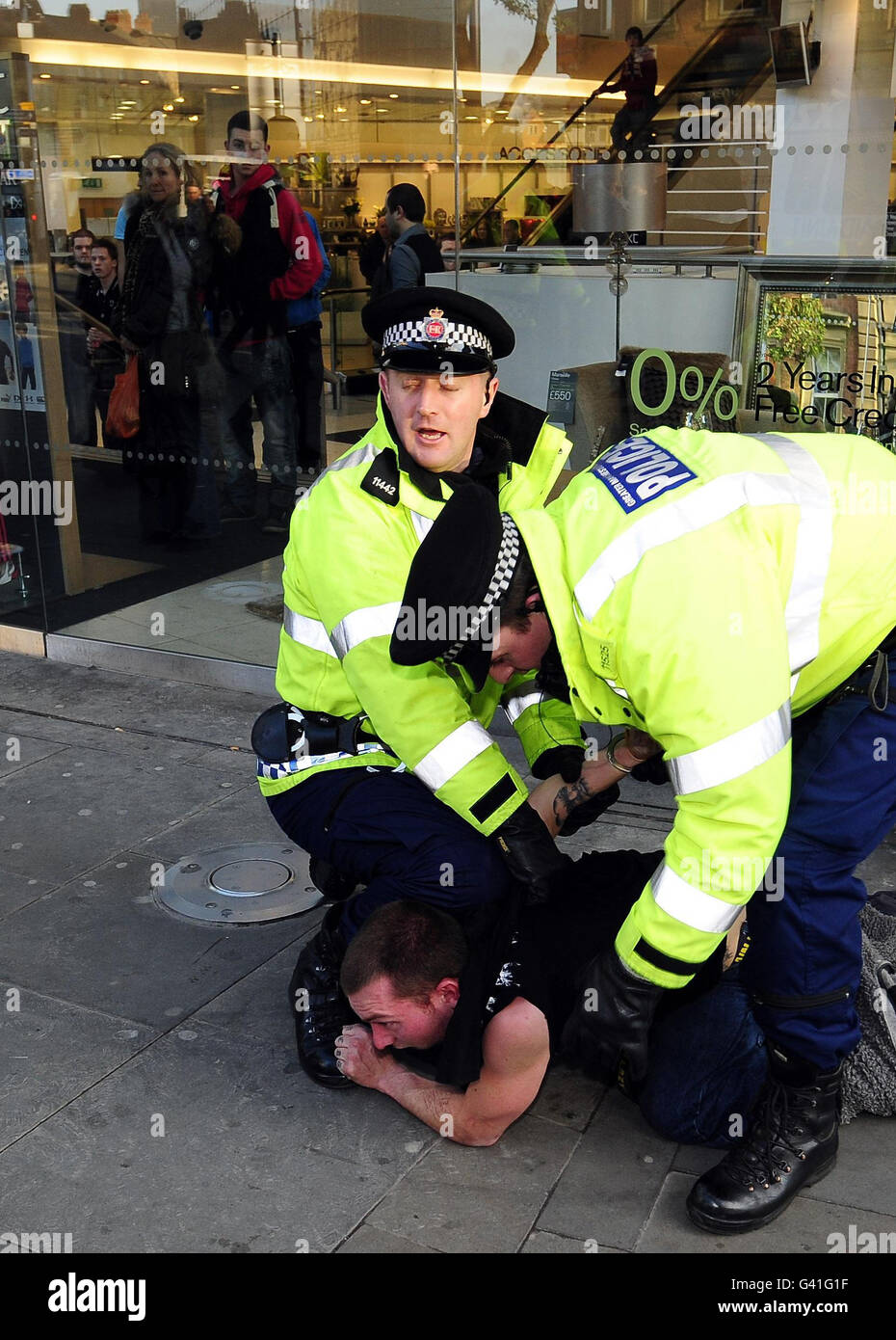 The Manchester demonstration turns violent as protestors try and break into city centre shops. Stock Photo