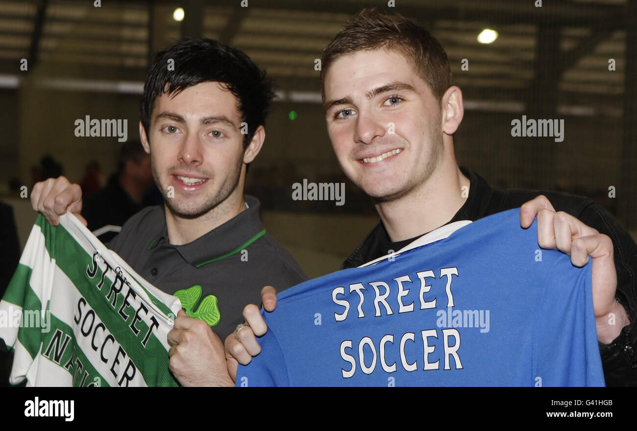 Celtic's Richie Towell (left) and Rangers' Kyle Hutton (right) launch a national football league aimed at engaging socially disadvantaged adults and young people, during a photocall at Soccerworld, Glasgow. Stock Photo