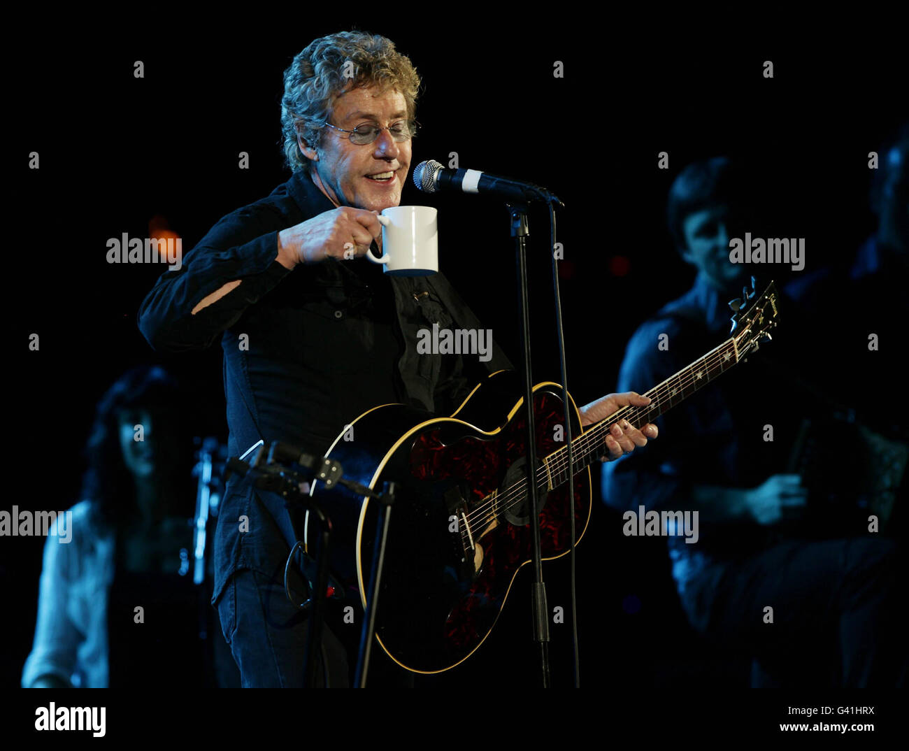 Roger Daltry takes a drink during A Concert For Killing Cancer, at HMV