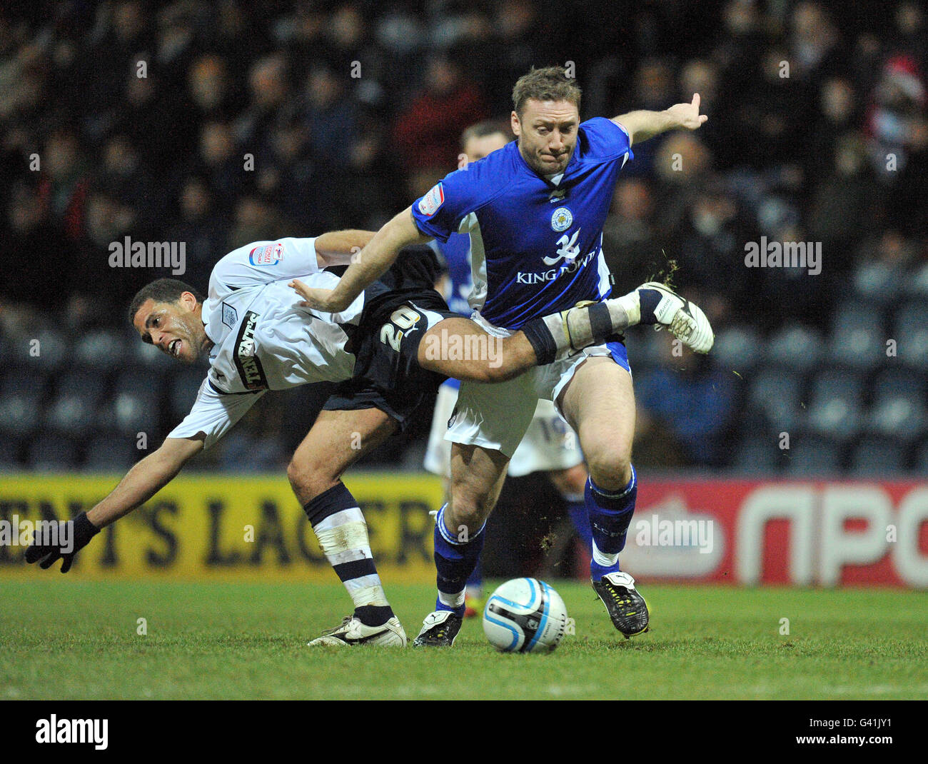 Preston North End's Darel Russell is brushed aside by Leicester City's Steve Howard Stock Photo